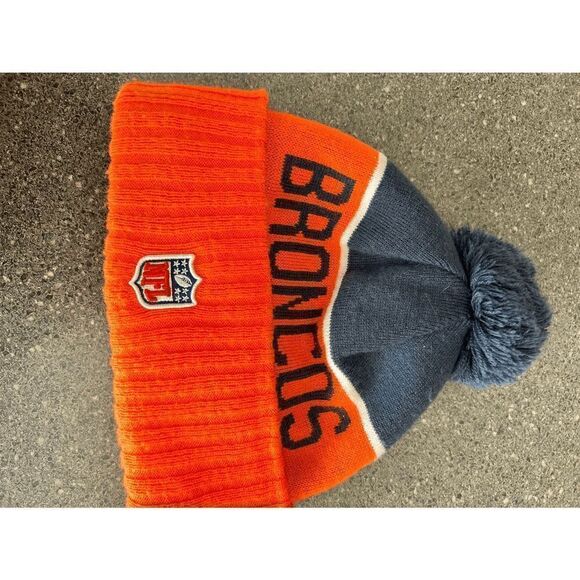 Denver Broncos New Era Orange Marl Cuffed Knit Hat with Pom